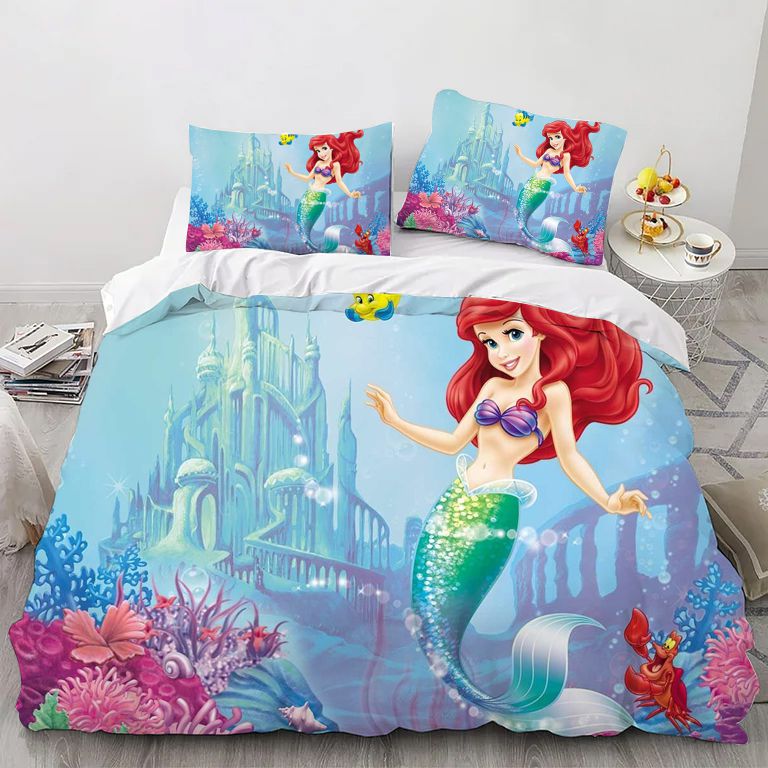 A bedding set featuring the animated character Mermaid Princess Ariel with a colorful underwater scene, including a duvet cover and pillowcases.
